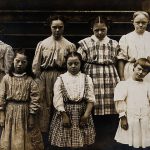 Vintage photo of girls with Down syndrome - nicely dressed.