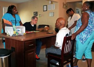 Direct-support professionals give the residents of the Robbinsville group home in New Jersey individual attention.