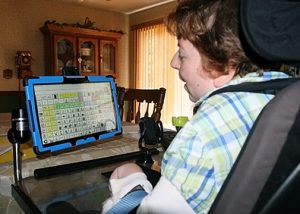 AAC Assistive Tech Tess: With her Accent 1400 communication device, Tess is able to do everyday tasks independently. 